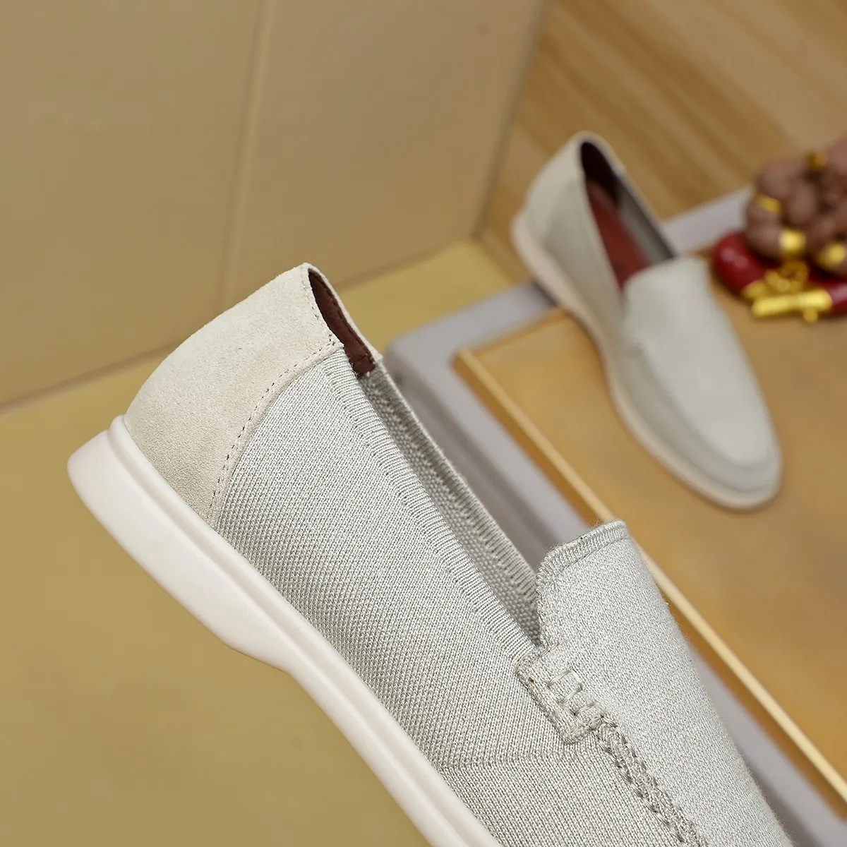 Men's Men's Shoes 💰 400 Loro PIana moccasin made of wish wool fabric. The upper is made of knitted fabric, made on a loom, and then attached to a rubber sole. The Rain System's water-repellent treatment enhances the shoe's functional design, while the suede details give the shoe a sense of elegance and sophistication. Made from Wish, fine wool from Australian and New Zealand Merino sheep 38-44
